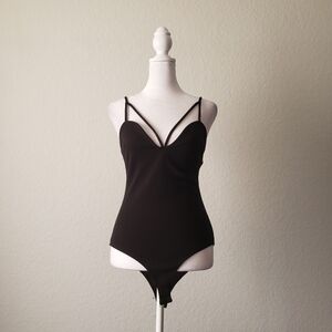 Sexy black multi-strap Charlotte Russe body suit in size M